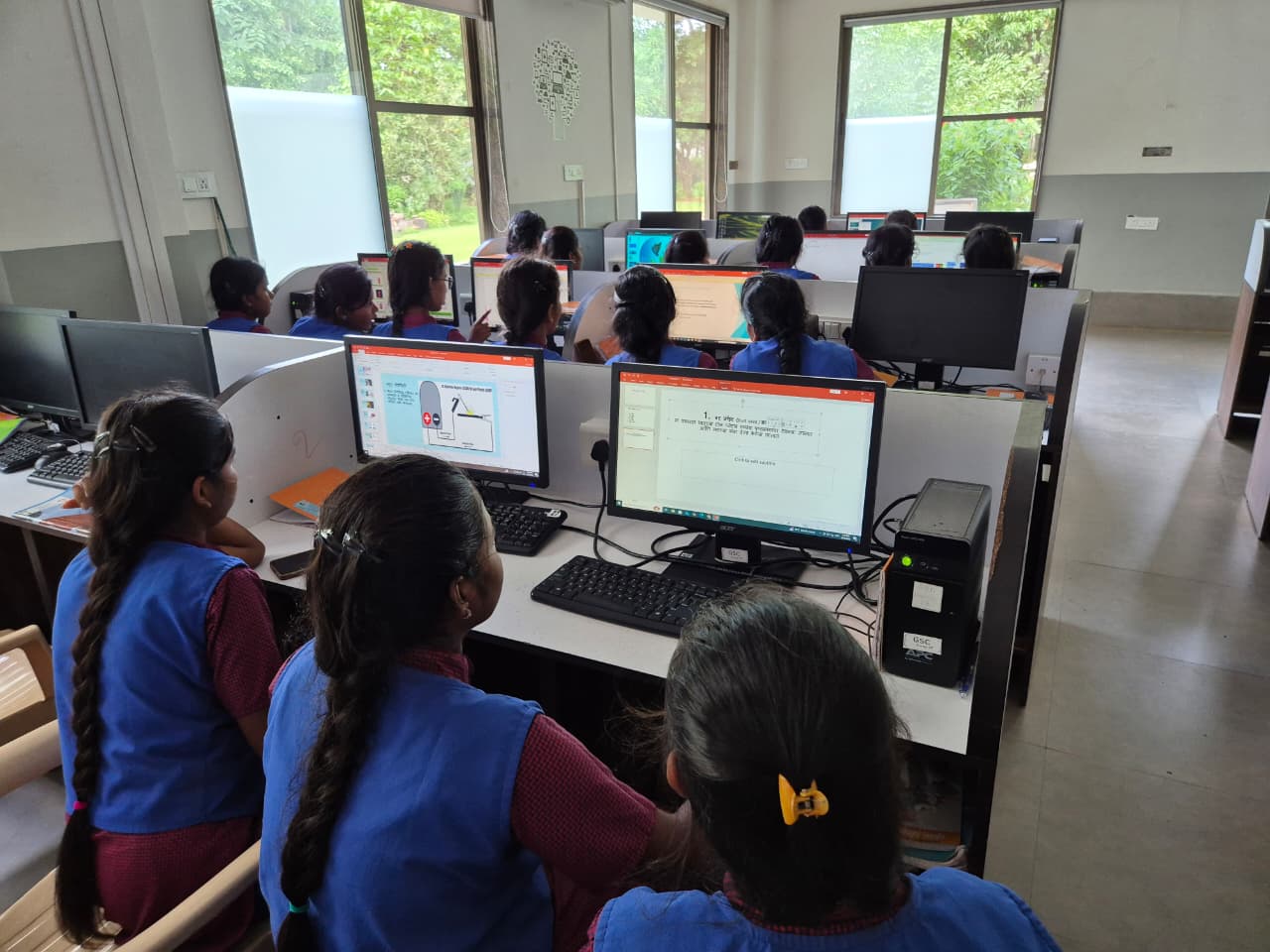 Girls learning at the GSC computer lab